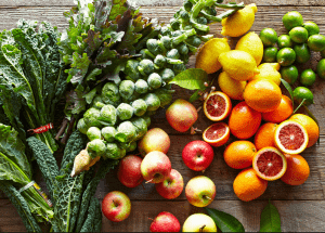 a group of fruits and vegetables on a wood surface Healthy Weight Loss Diets Lichfield